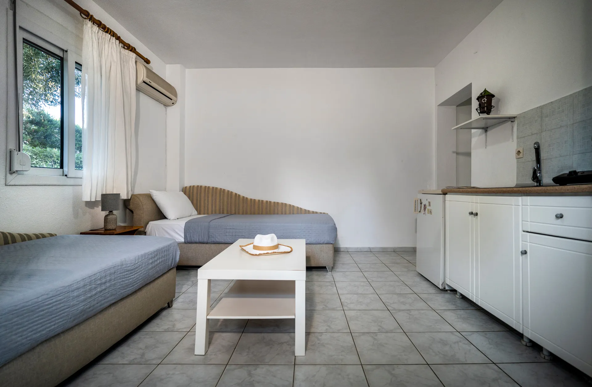 Tiara Holidays - Dionisos Resort - Economy Apartment - living room